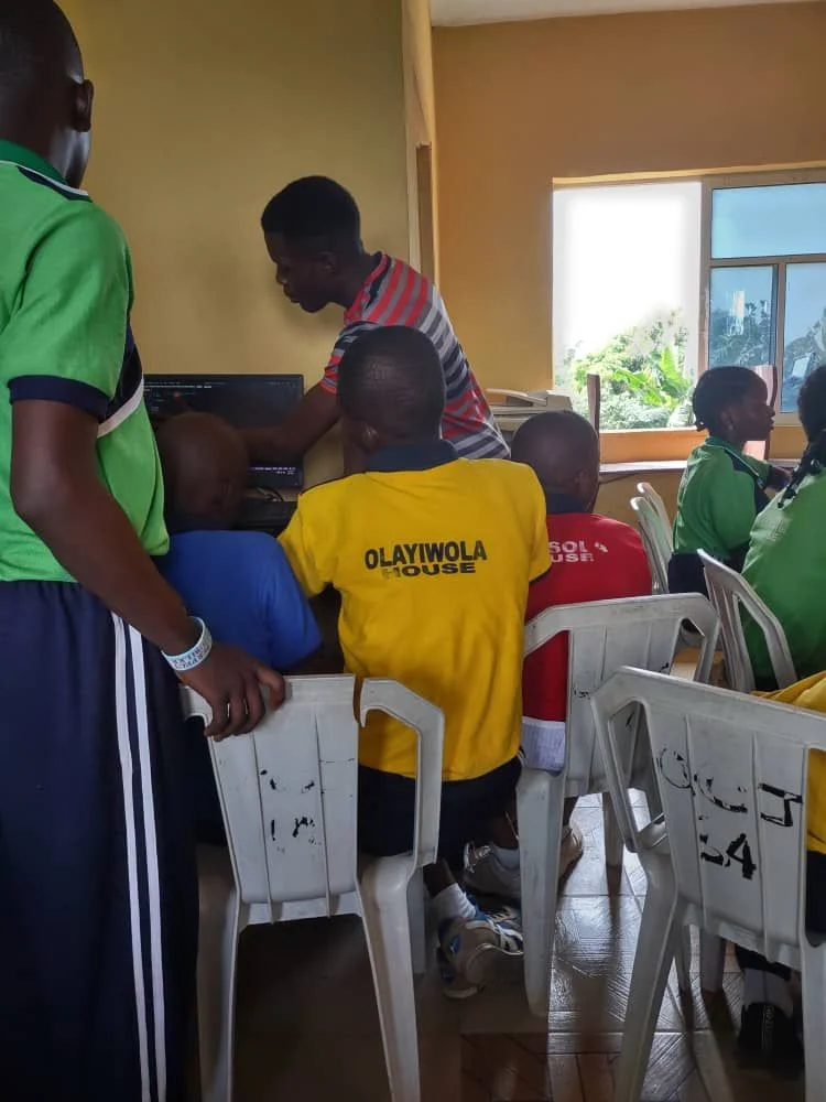 Working with students during the free three-day training at Pelican.
